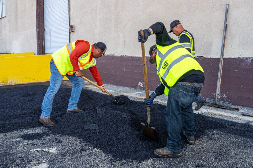 Expert Bay Cities Paving team offering quality asphalt crack sealcoating